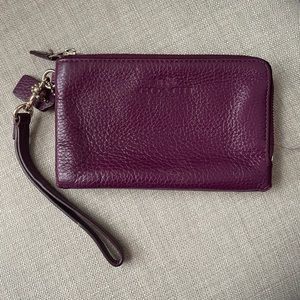 COACH double zipper wristlet. Purple